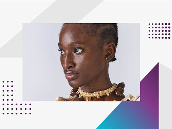 Young woman wearing traditional necklace, surrounded by graphics, as part of research about African creative businesses